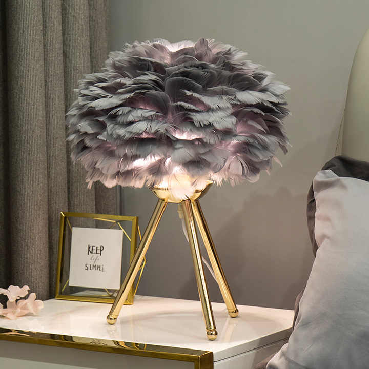BowLift Table Lamp by FeatherLux – Dimmable Lighting with an Elegant Feather Design