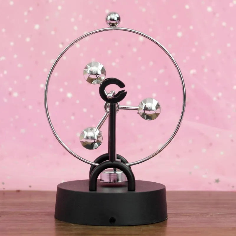 LZINA™ | Newton Pendulum Ball, which represents perpetual motion
