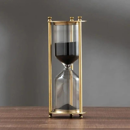 BowLift | Antique hourglass made of brass with violet sand