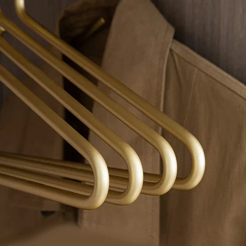 BowLift | 5 pieces of hangers made of solid matte gold/silver │ Seamless wardrobe organizer made of metal