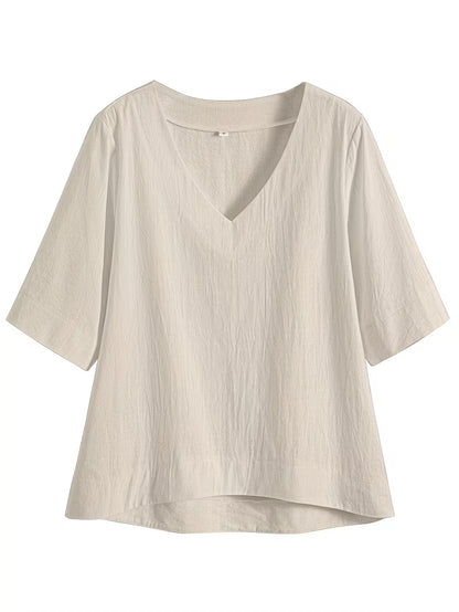 A light beige linen-blend top with a V-neckline and elbow-length sleeves, displayed flat against a solid white background.