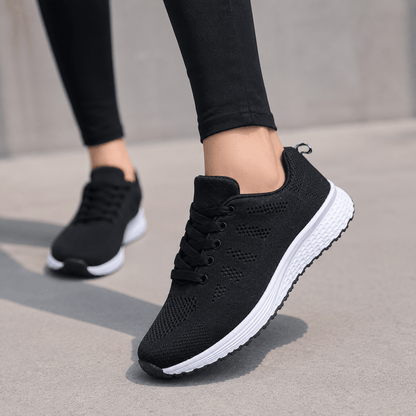 Women’s White Mesh Walking Trainers with Lace Up Closure and Flat Rubber Sole