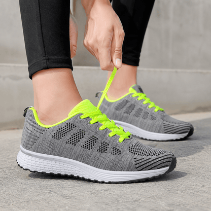 Women’s White Mesh Walking Trainers with Lace Up Closure and Flat Rubber Sole