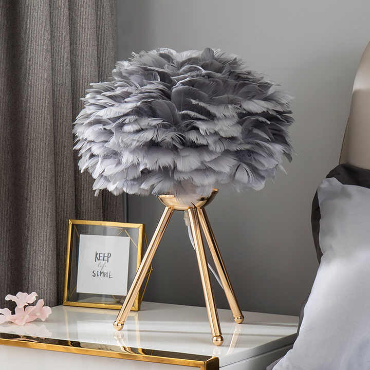 BowLift Table Lamp by FeatherLux – Dimmable Lighting with an Elegant Feather Design