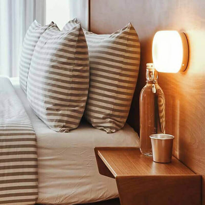 BowLift | Sleek, Futuristic Solid Plexiglass Wall Lamp — A Unique Modern Accent