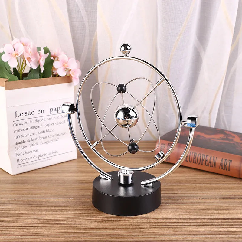 LZINA™ | Newton Pendulum Ball, which represents perpetual motion