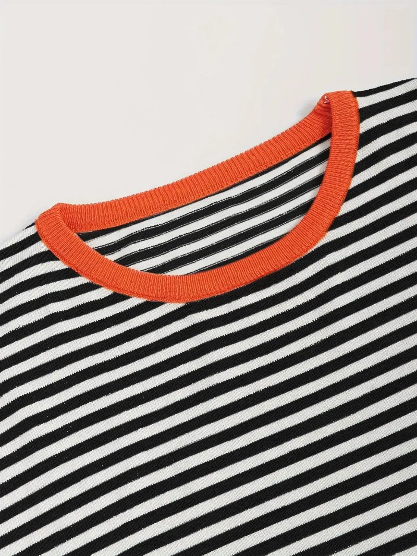 Women’s Black White Striped Knit Sweater with Orange Trim and Long Sleeves
