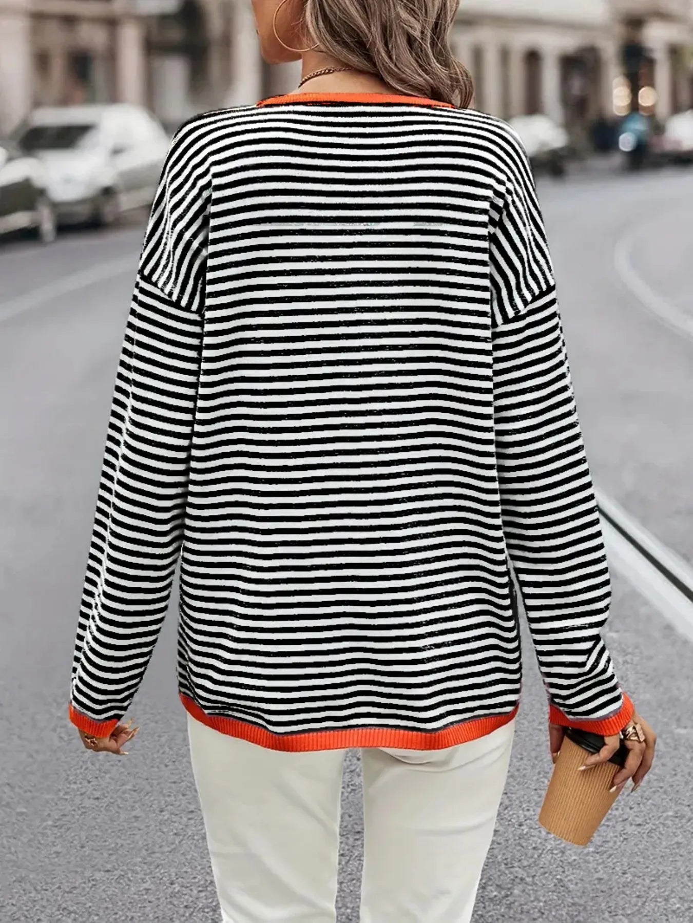 Women’s Black White Striped Knit Sweater with Orange Trim and Long Sleeves