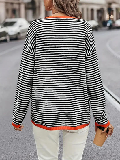 Women’s Black White Striped Knit Sweater with Orange Trim and Long Sleeves