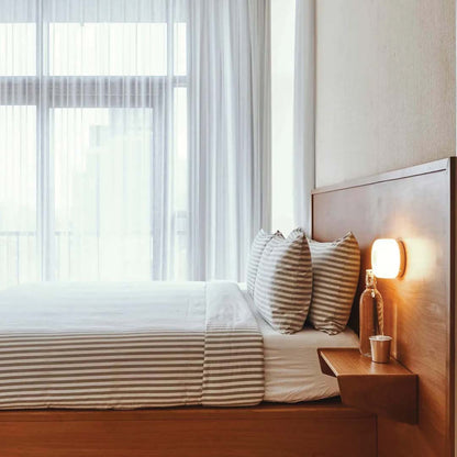 BowLift DimpleGlow — Chic Wall Lamp for Modern Interiors