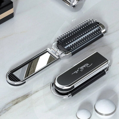 Compact hairbrush with integrated mirror | Bowlift