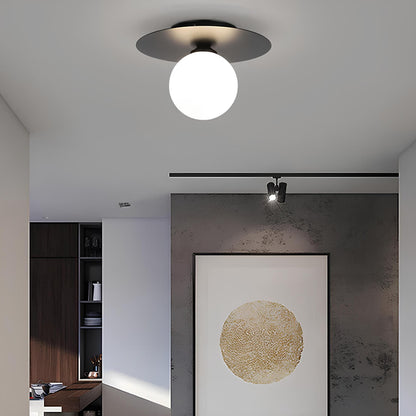 BowLift | LumiNoble | Timeless ceiling light with golden LED ball design