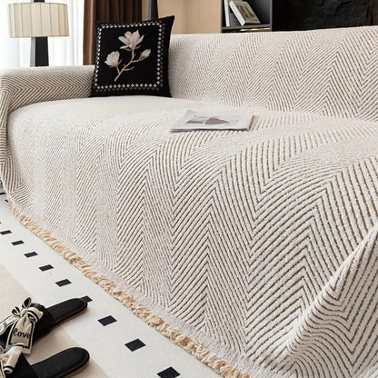 BowLift | CUSHVIVE – Herringbone Sofa Cover with Splash Protection and Non-Slip Design