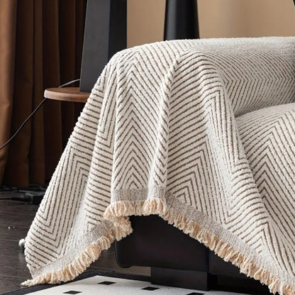 BowLift | CUSHVIVE – Herringbone Sofa Cover with Splash Protection and Non-Slip Design